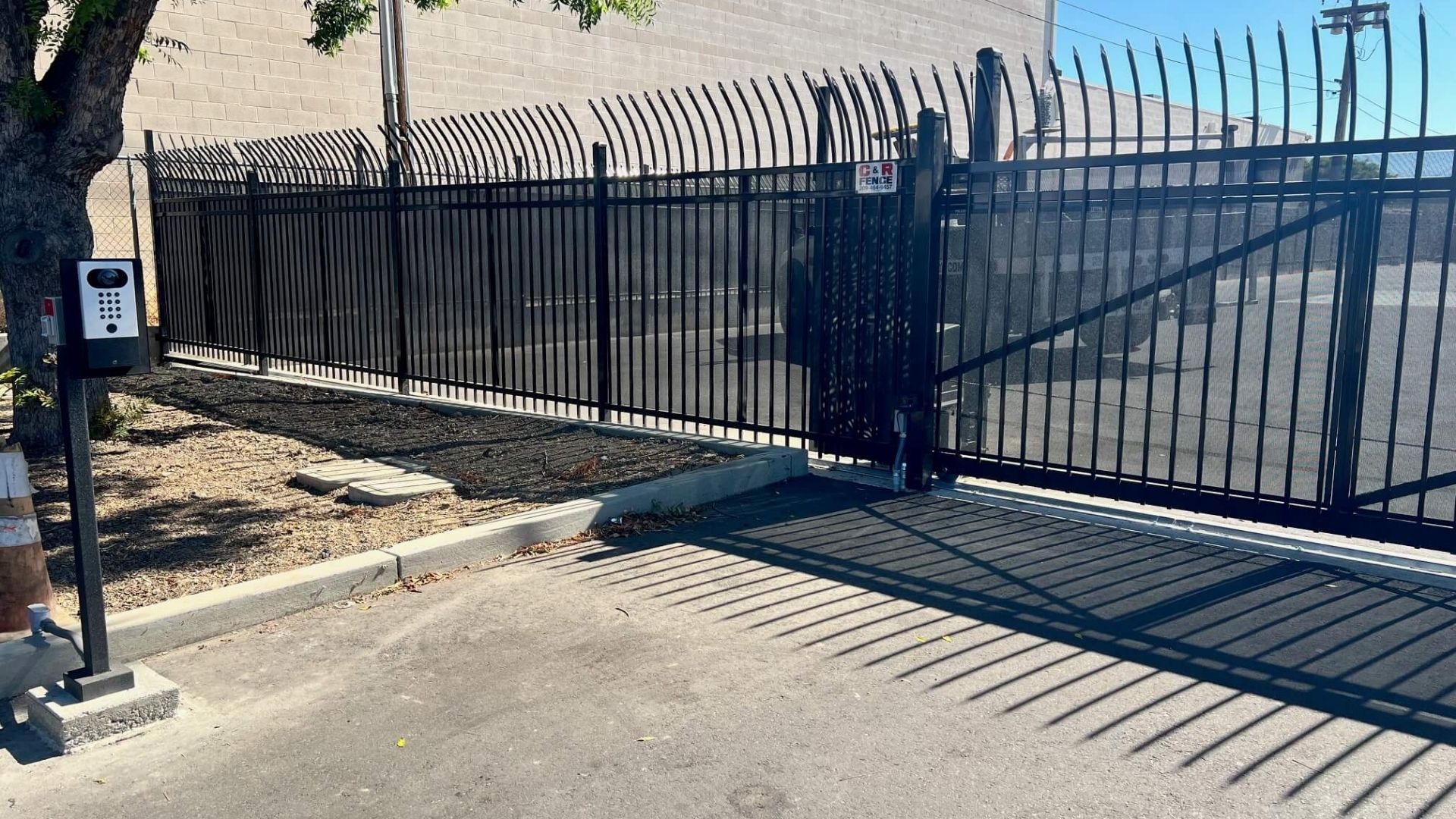 Iron security fence and automated vehicle gate at Hannah’s House in Modesto, CA